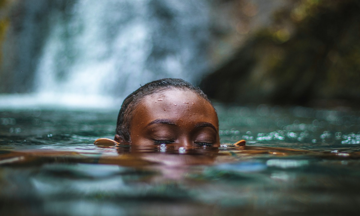 woman submerged in water