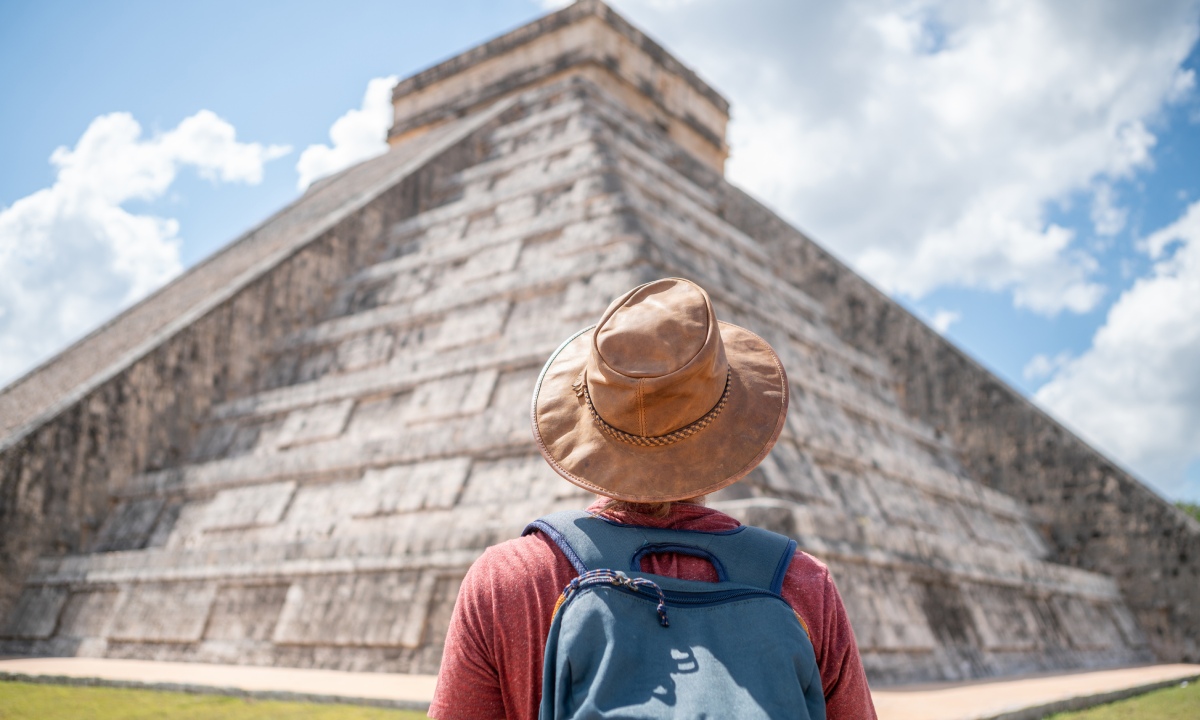 A tourist admiring Chichen Itza