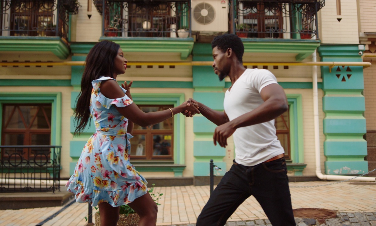 A couple dancing in the street