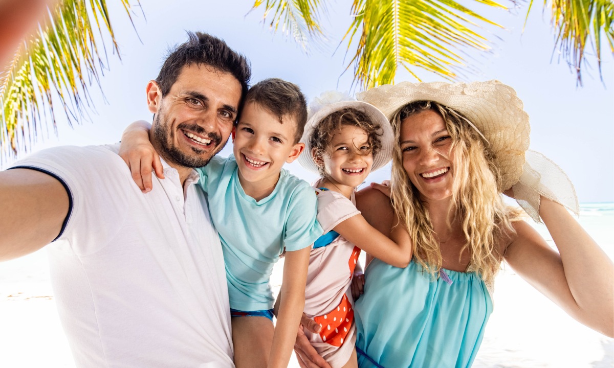 Smiling family on the beach
