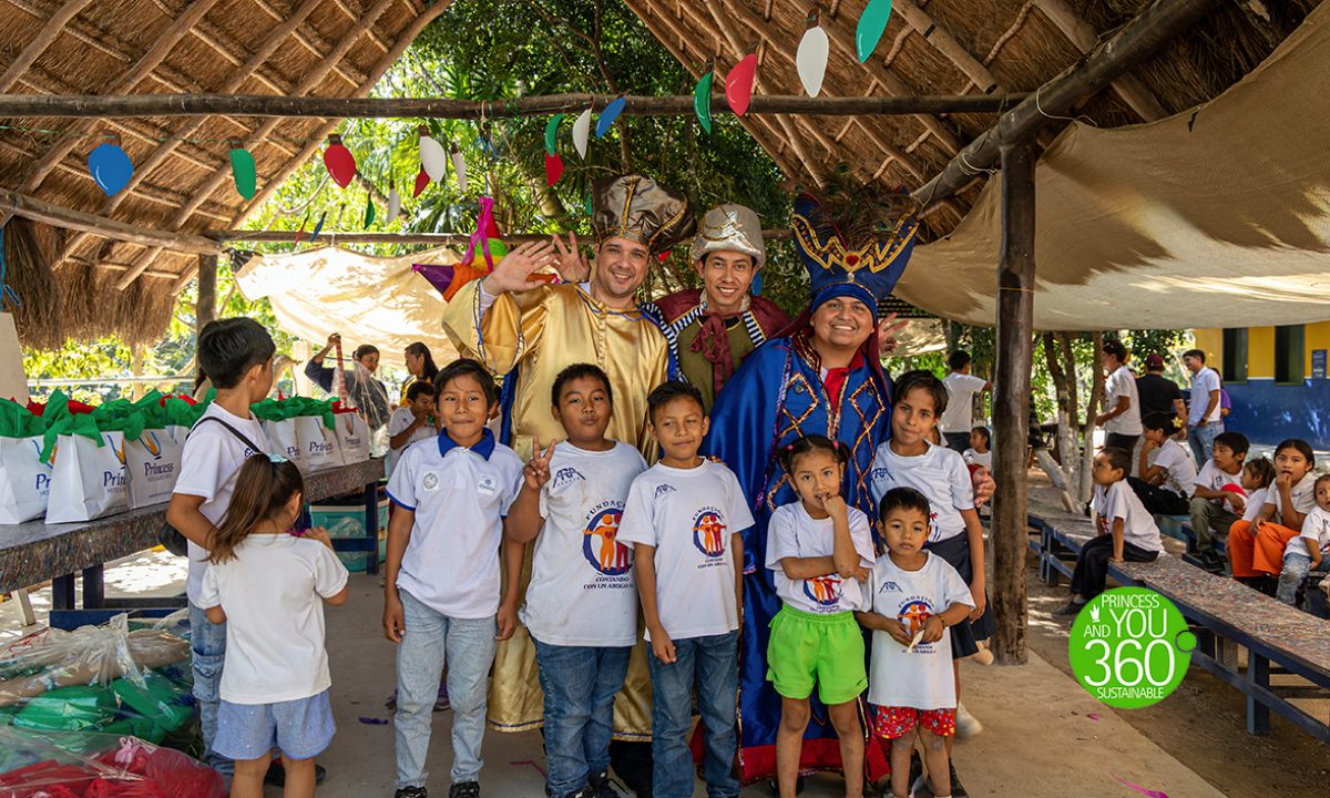 Children posing with gift bearers