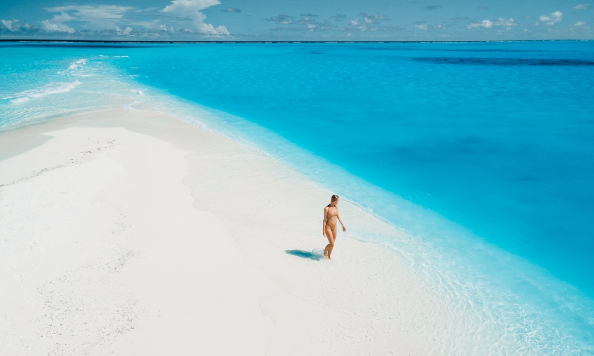 A woman on Punta Mosquito beach