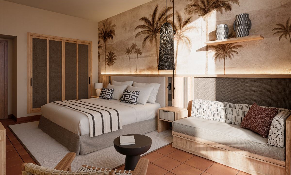 Bedroom interior with integrated seating area next to the bed