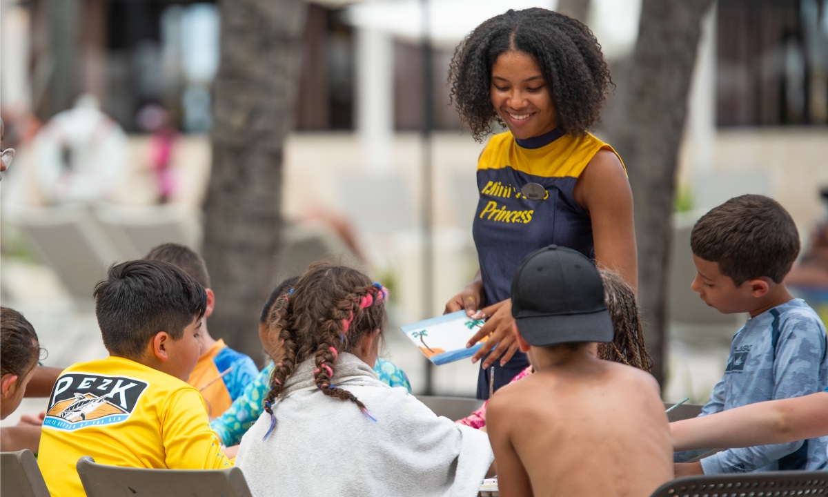 Activity leader with children at a kids’ workshop