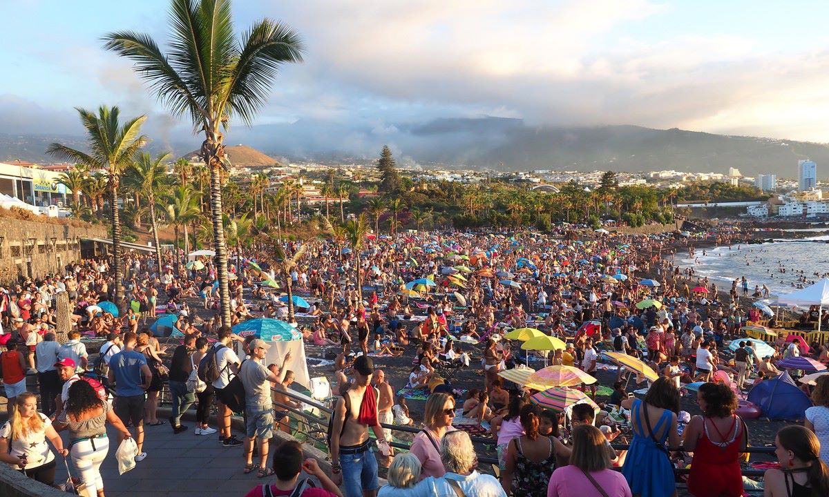Playa Jardín in Puerto de la Cruz, Tenerife, with large crowds during the San Juan Night celebrations