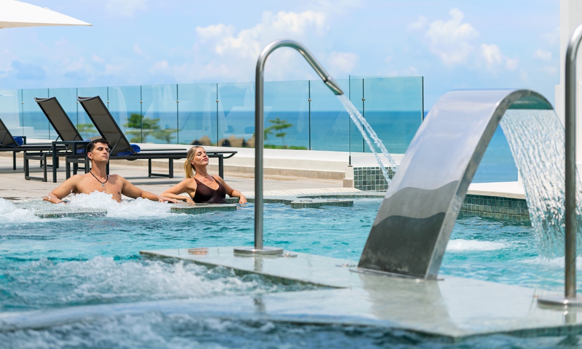 A couple in an outdoor hot tub